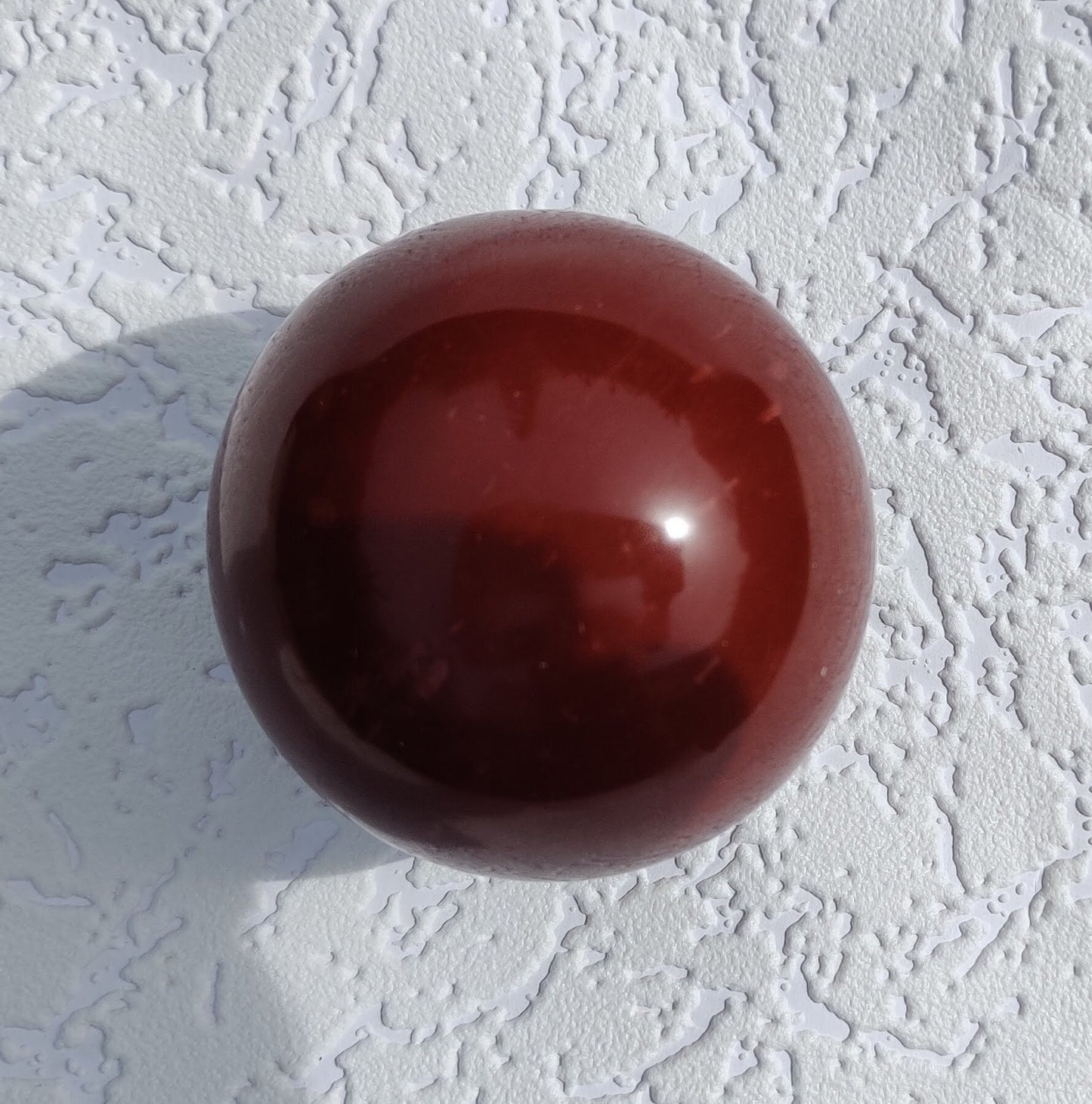 Captivating "Crimson Earth" Brazilian Red Jasper Sphere: Grounding Power and Mesmerizing Presence